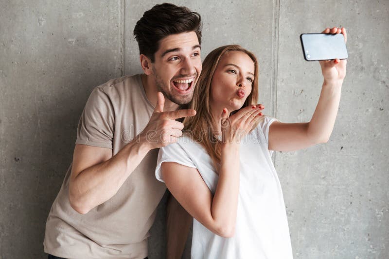 Image Of Lovely Couple Man And Woman Taking Selfie Photo On Smar Stock