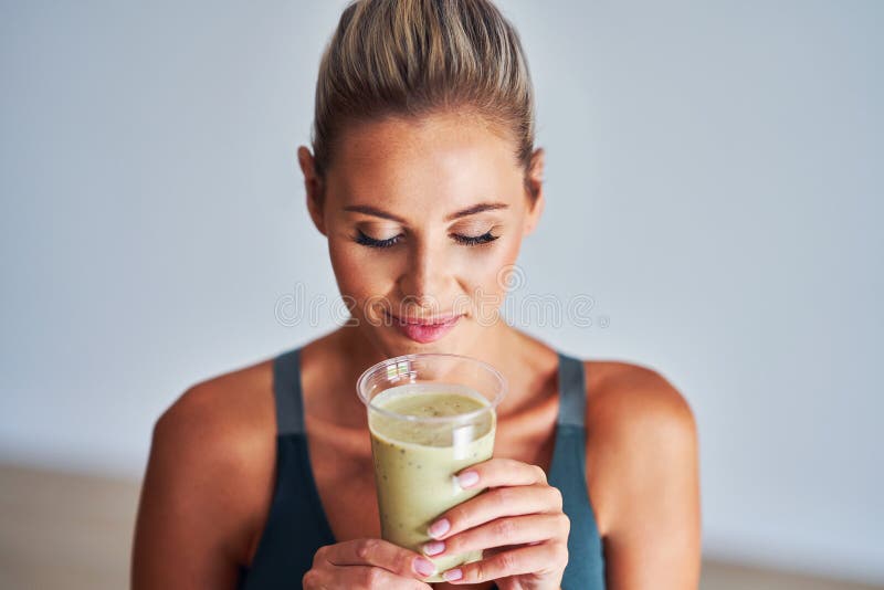 Adult Woman Drinking Healthy Smoothie After Workout Stock Photo Image