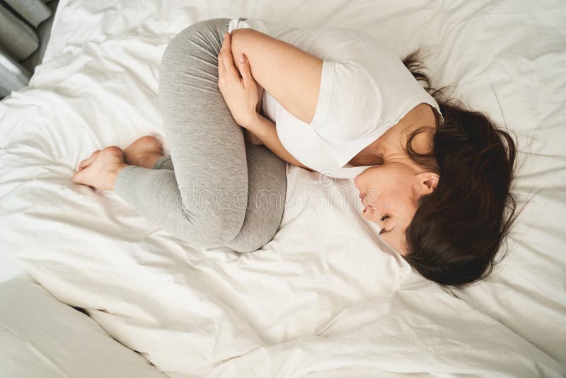 Woman With Closed Eyes Lying In A Fetal Position Stock Image Image Of