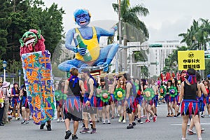 Costumed revelers march with floats in the annual Dream Parade o