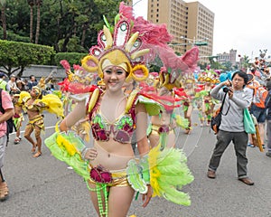 Costumed revelers march with floats in the annual Dream Parade o