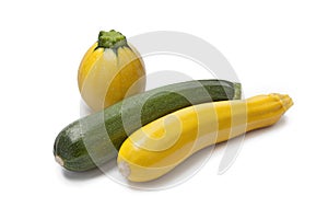 Gelbe, grüne, runde Zucchini