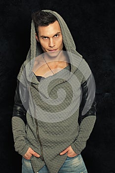 Mysterious man with hood. Portrait fashionable man