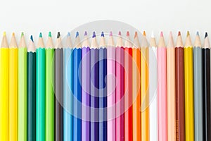 Row of color pencil crayons