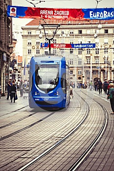 Zagreb, Croatia. Street crowd and tram