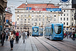 Zagreb, Croatia. Street crowd and tram