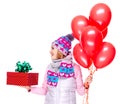 Adult woman with red gift box and balloons looking side