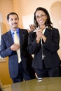 African-American businesswoman getting pat on back