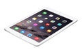 Apple Silver iPad Air 2 with iOS 8 lies on the surface, designed