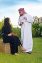 Arabian couple relaxing & drinking tea Royalty Free Stock Photo