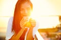 Asian Woman Drinking Coffee In...
