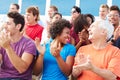 Audience Applauding At Outdoor Concert Performance