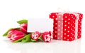 Beautiful tulips with red polka-dot gift box. happy mothers day,