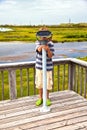 Boy Watching Nature Through A ...
