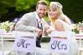 Bride And Groom Enjoying Meal ...