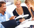 Business People Reading A Book...