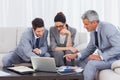 Business People Using Laptop A...