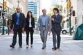 Business People Walking Togeth...