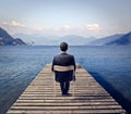 Business Man Looking At The Lake