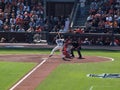 Buster Posey lifts foot as he prepares to swings at pitch