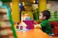 Child Playing Indoors