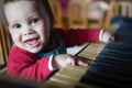 Child Playing The Piano