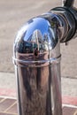 Chrome-plated fire hydrant with reflection of skyscraper in San Diego