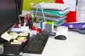 Close-up of real life messy desk in  office