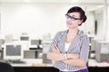 Confident businesswoman in office posing at the Stock Photography