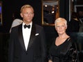 Daniel Craig and Judy Dench