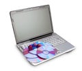 Discs for recording data on a modern laptop white background Royalty Free Stock Photos