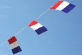 Dutch national flags in a blue sky, Netherlands 