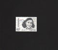 Dutch stamp with image of Anne Frank.