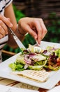 Eating salad in a restaurant Royalty Free Stock Photography