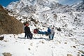 Emergency evacuate an injured climber nepal himalayas gorak shep march sherpas prepare for on march in gorak shep sagarmatha Stock Photography
