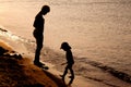 Family Playing On Beach