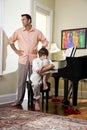 Father and teenage son at home upset Stock Images