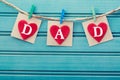 Fathers day message on felt hearts