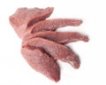 Five slices of raw meat viewed from top