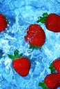 Fresh strawberries in water
