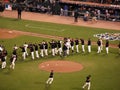 Giants Players high five to celebrate winning game