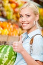Girl At The Market Choosing Fr...