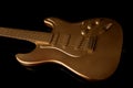 Gold Electric Guitar On A Dark...