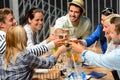 Group Of Cheerful People Toast...