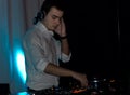 Handsome DJ Mixing Music On Hi...