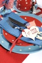 Happy Fourth of July dining table place setting close up