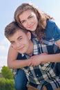 Happy riding Young couple hugging & blue sky Stock Images