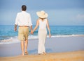 Happy senior couple on the beach retirement luxury tropical res resort Royalty Free Stock Photography