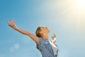 Happy young woman open her arms to the sky and enjoying life Royalty Free Stock Photo
