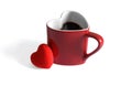 Heart shaped coffee mug dived in coffee beans, Valentines day.  feb 2, 2015